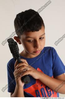 TIMBO STANDING POSE WITH GUN